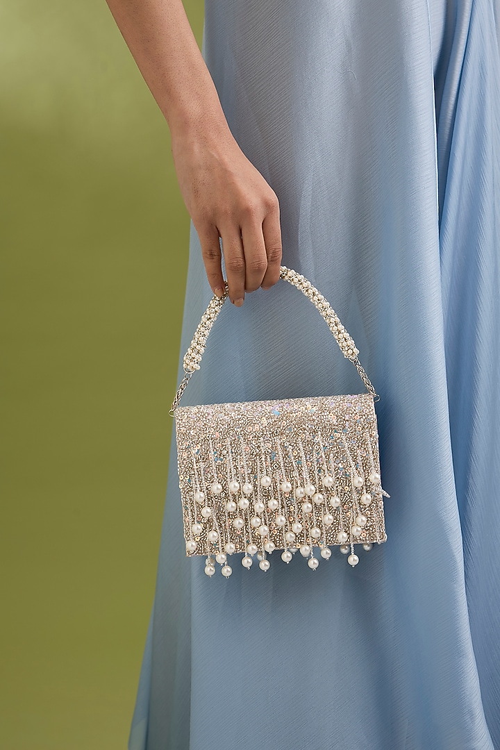Silver Sunshine Sunshine Faux Leather Pearl Embellished Potli by BEAU MONDE at Pernia's Pop Up Shop