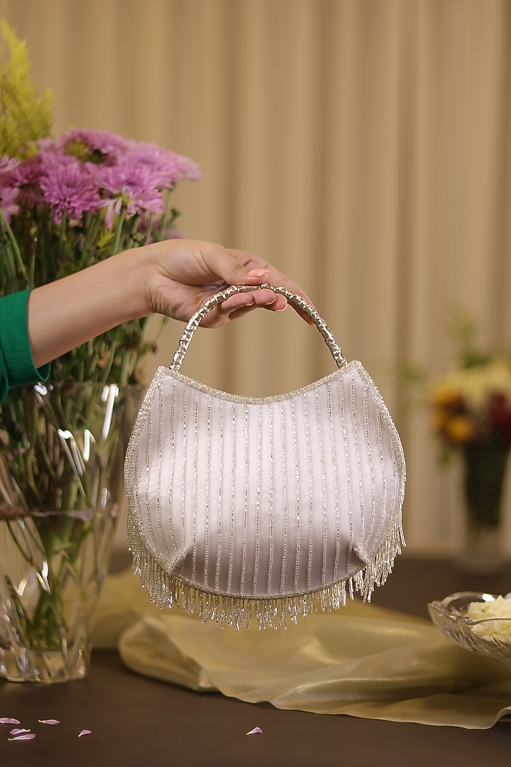 Radiance Silver Satin Potli Bag by Be Chic at Pernia's Pop Up Shop