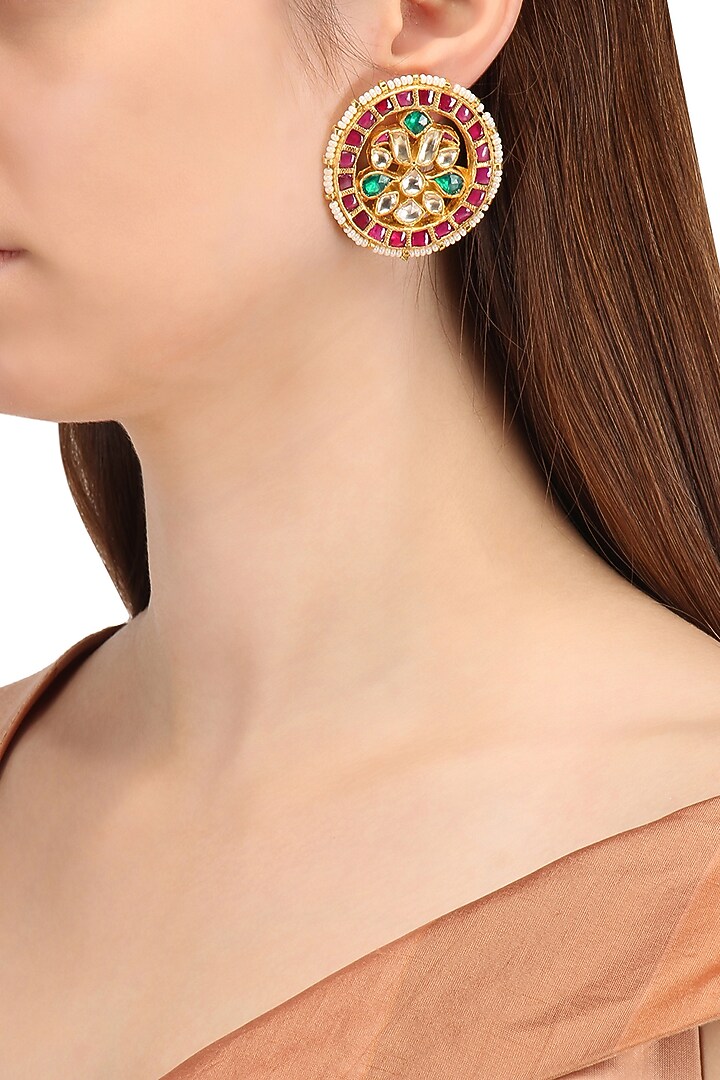 Gold finish kundan and pearls stud earrings available only at Pernia's Pop Up Shop.
