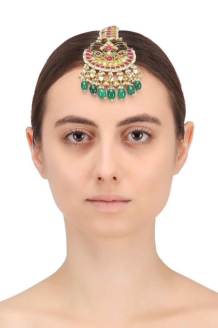 Gold finish multi-coloured kundan and pearls crescent maangtika available only at Pernia's Pop Up Shop.