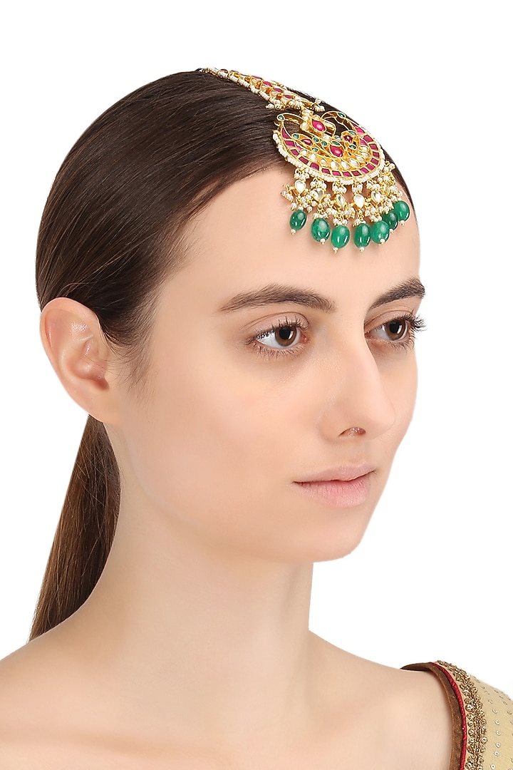 Gold finish multi-coloured kundan and pearls crescent maangtika available only at Pernia's Pop Up Shop.