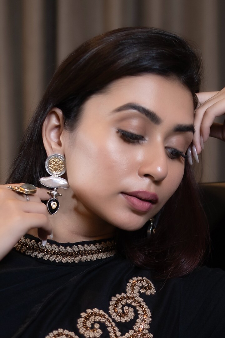 White Finish Mother Of Pearls & Black Onyx Stone Dangler Earrings In Sterling Silver by Bhatter's at Pernia's Pop Up Shop