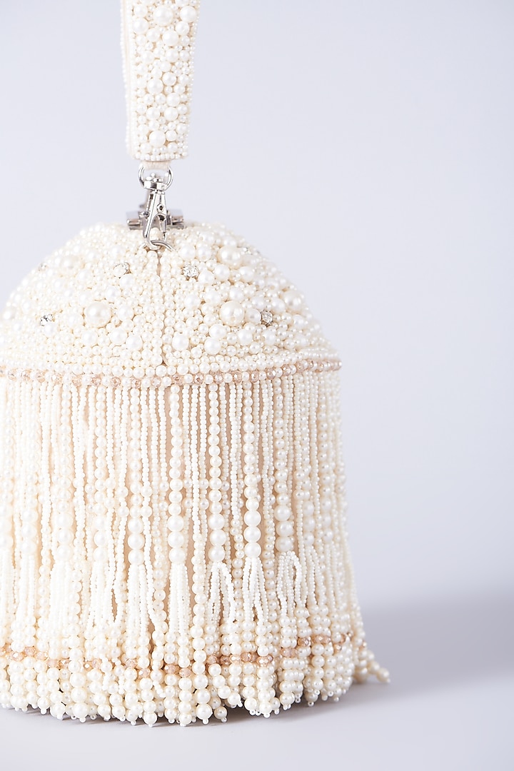 Ivory Hand Embroidered Potli by BHAVNA KUMAR at Pernia's Pop Up Shop