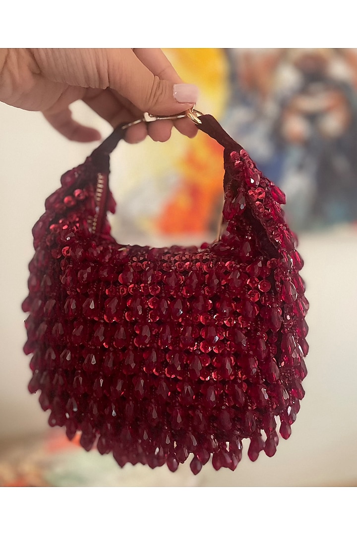 Maroon Suedette Embroidered Crescent Bag by BHAVNA KUMAR at Pernia's Pop Up Shop
