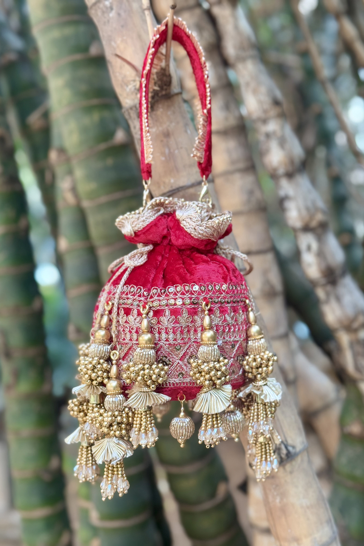 Red Velvet Beads Embroidered Potli by BHAVNA KUMAR at Pernia's Pop Up Shop