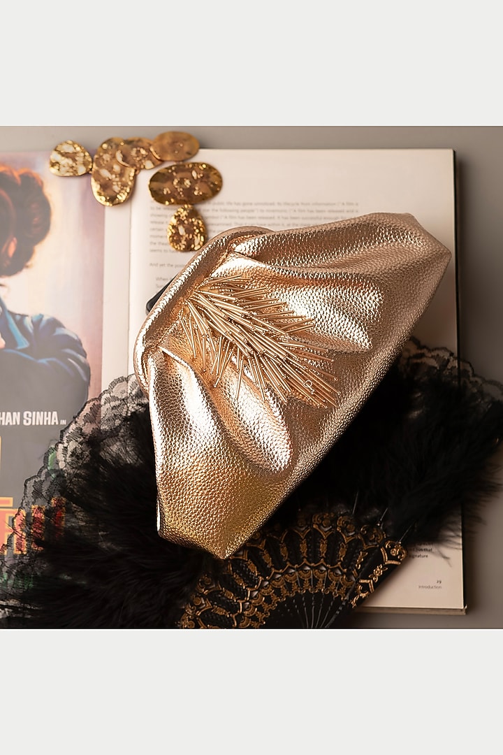 Gold Vegan Leather Clutch by BHAVNA KUMAR at Pernia's Pop Up Shop