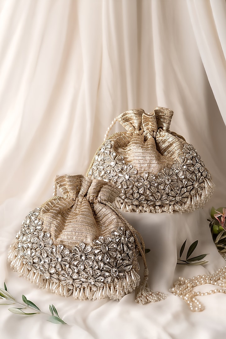 Gold & Silver Fabric Hand Embroidered Potli by BHAVNA KUMAR at Pernia's Pop Up Shop