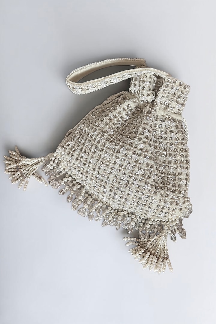 White Faux Silk Hand Embroidered Potli by BHAVNA KUMAR at Pernia's Pop Up Shop