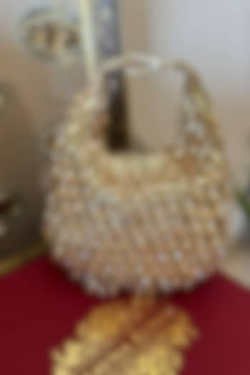 Gold Suedette Bead Embroidered Crescent Clutch by BHAVNA KUMAR at Pernia's Pop Up Shop