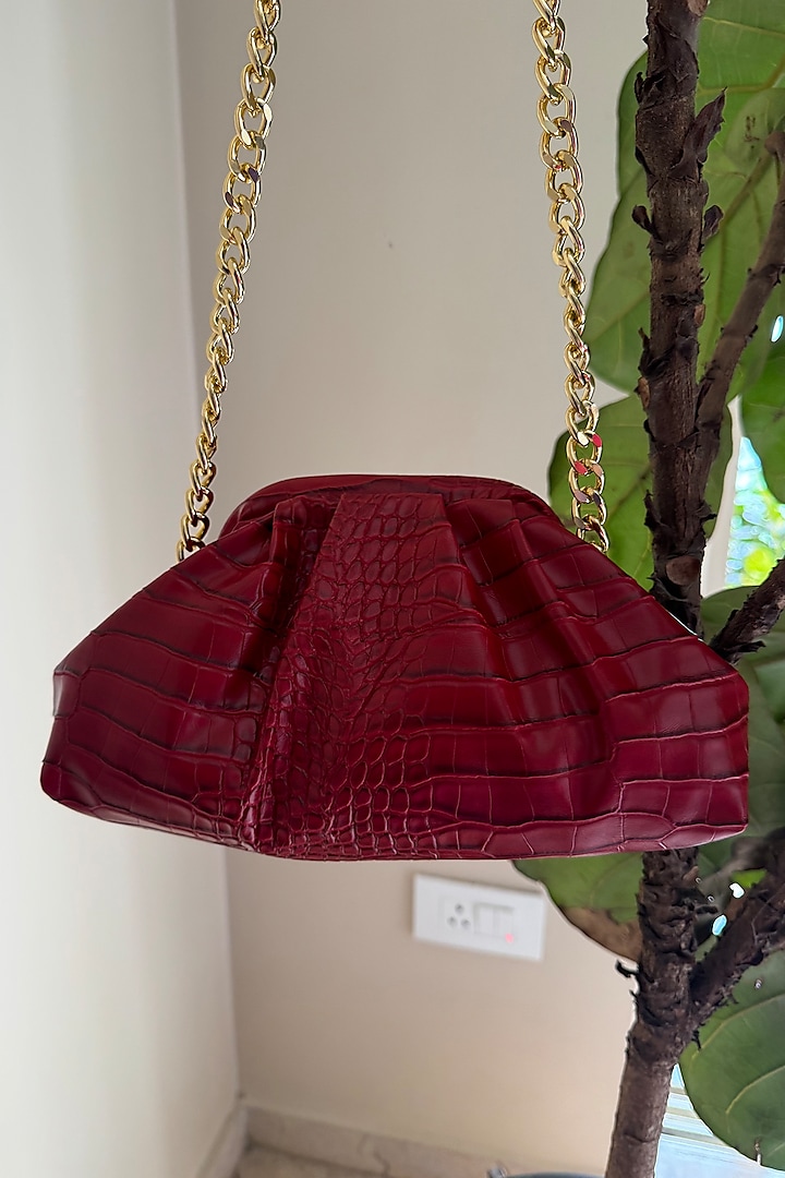 Wine Vegan Leather Clutch by BHAVNA KUMAR at Pernia's Pop Up Shop