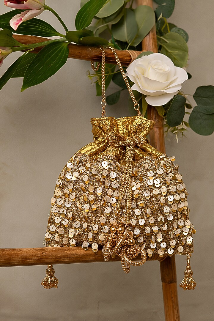 Gold Gota Fabric Mother Of Pearls Potli Bag by BHAVNA KUMAR at Pernia's Pop Up Shop