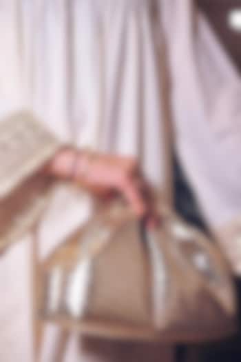 Gold Vegan Leather Puff Clutch Bag by BHAVNA KUMAR at Pernia's Pop Up Shop