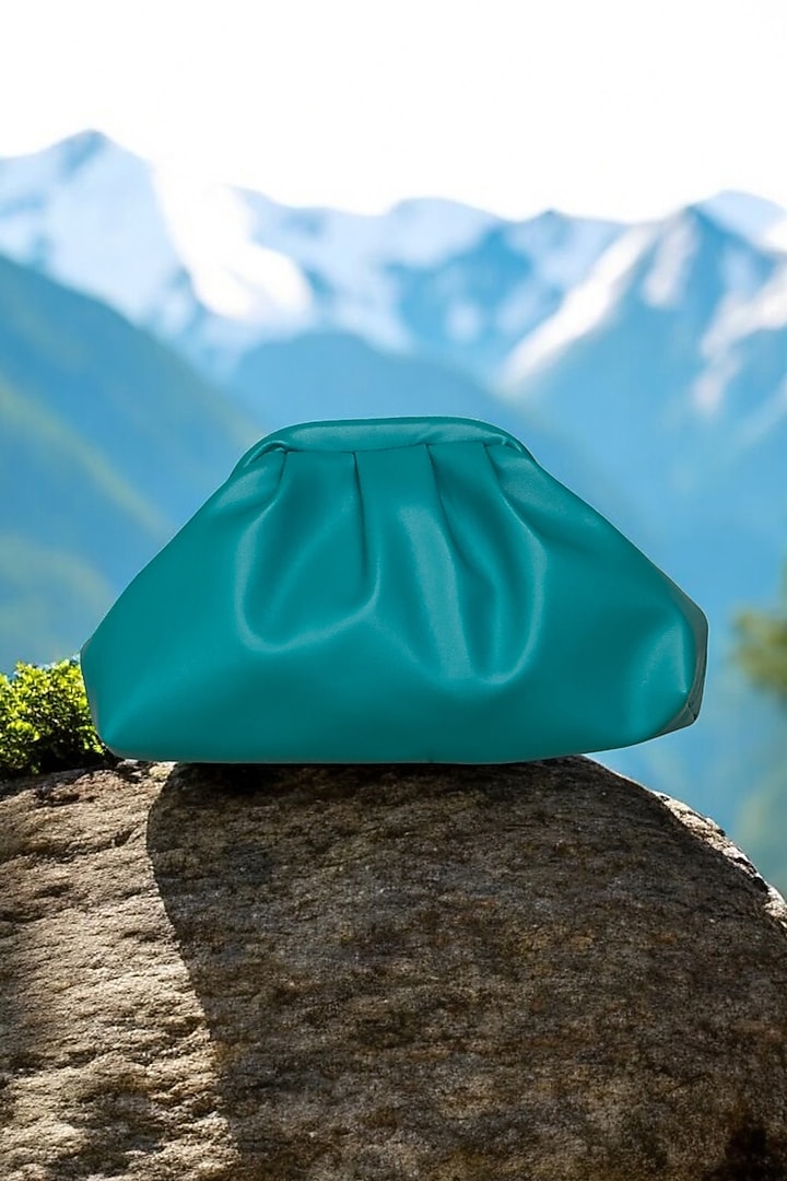 Teal Vegan Leather Puff Bag by BHAVNA KUMAR at Pernia's Pop Up Shop
