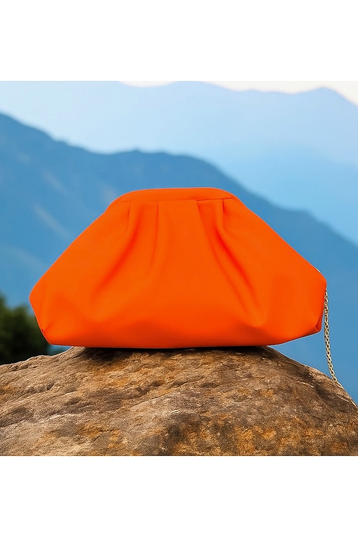 Neon Orange Vegan Leather Puff Bag by BHAVNA KUMAR at Pernia's Pop Up Shop