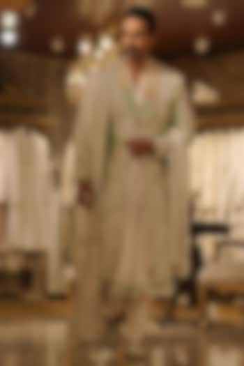 Green Raw Silk Thread Hand Embroidered Groom Sherwani Set by Bharat Reshma at Pernia's Pop Up Shop