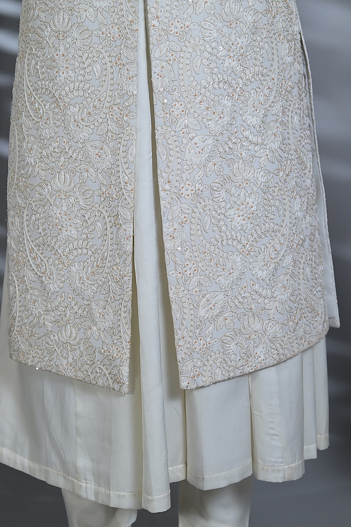 White Matka Silk Thread & Pearl Embroidered Groom Sherwani Set by Bharat Reshma at Pernia's Pop Up Shop