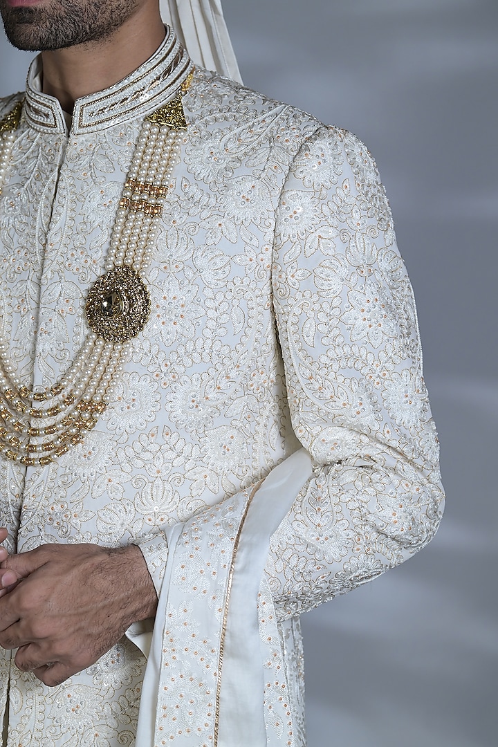White Matka Silk Thread & Pearl Embroidered Groom Sherwani Set by Bharat Reshma at Pernia's Pop Up Shop