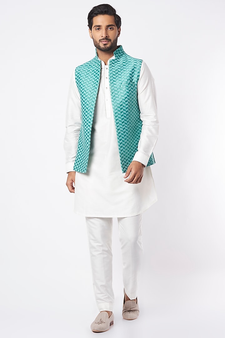 Medium Turquoise Pure Silk Nehru Jacket by VARENYA