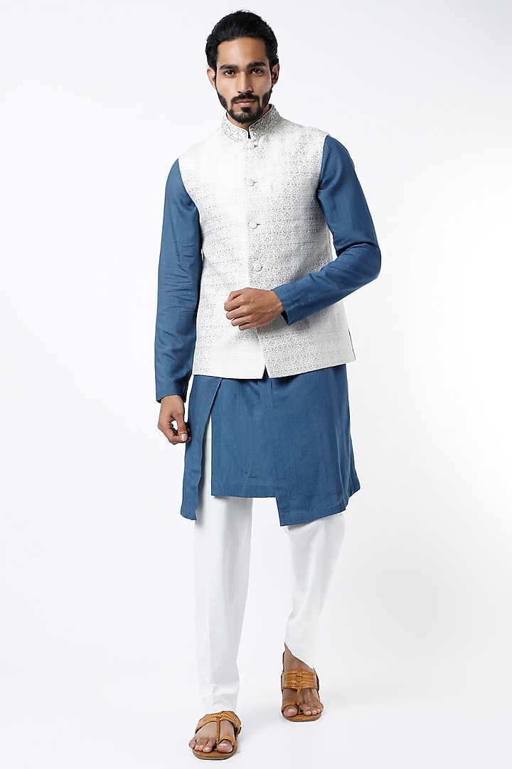 White Blended Silk Nehru Jacket by VARENYA