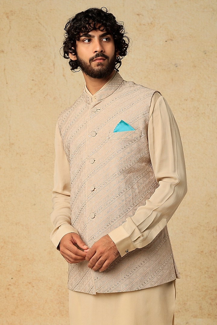 Beige Embroidered Nehru Jacket by VARENYA at Pernia's Pop Up Shop