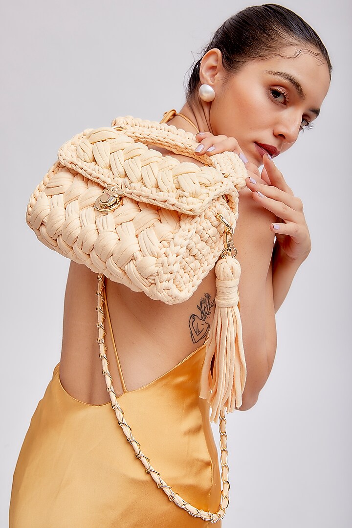 Cream Cotton Yarn Sling Bag by Bijit at Pernia's Pop Up Shop