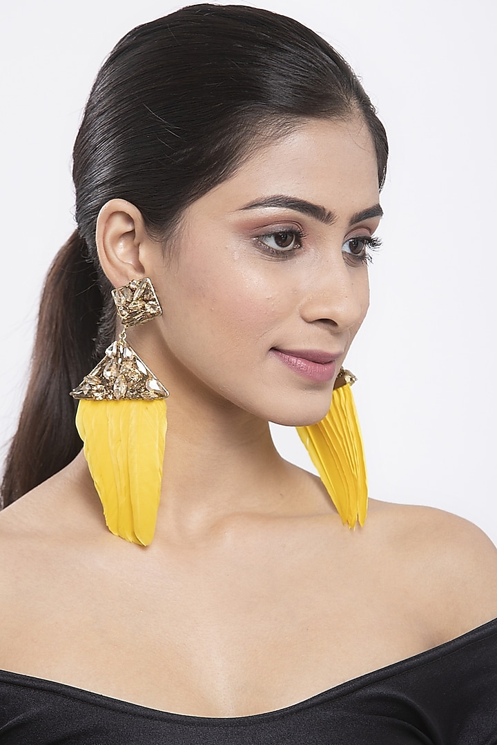 Gold Finish Feather Earrings With Yellow Zircons by Bijoux By Priya Chandna at Pernia's Pop Up Shop