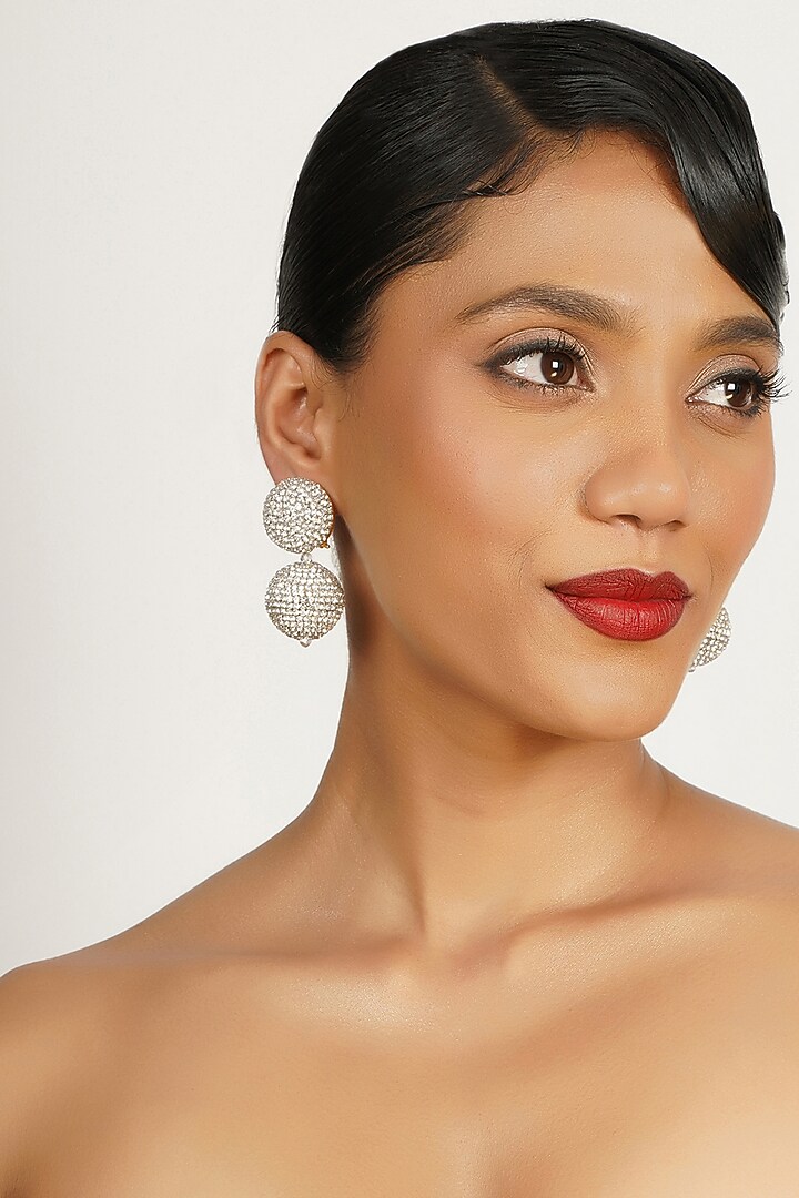 Gold Finish Crystal Dangler Earrings by Bijoux By Priya Chandna at Pernia's Pop Up Shop