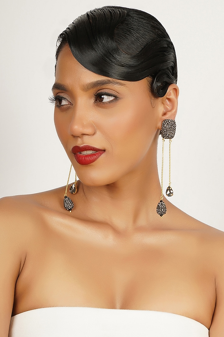 Gold Finish Crystal Dangler Earrings by Bijoux By Priya Chandna at Pernia's Pop Up Shop