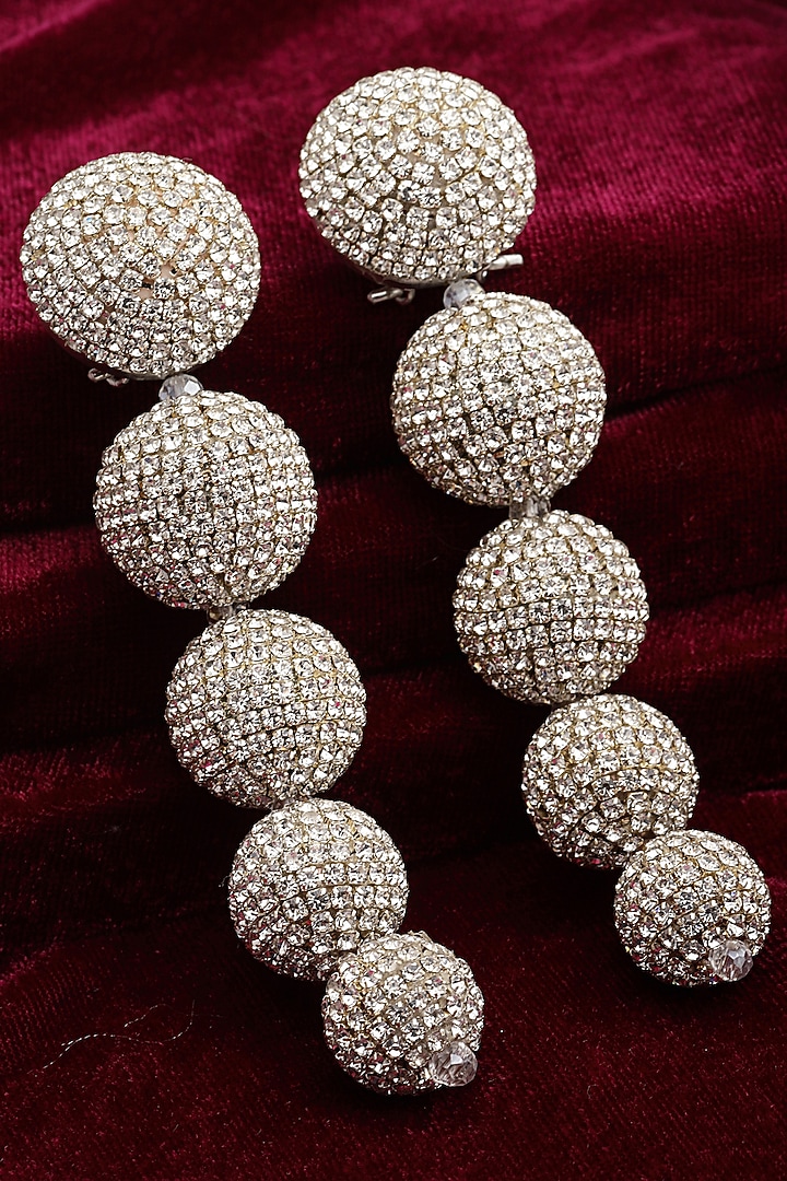 Gold Finish Crystal Dangler Earrings by Bijoux By Priya Chandna at Pernia's Pop Up Shop