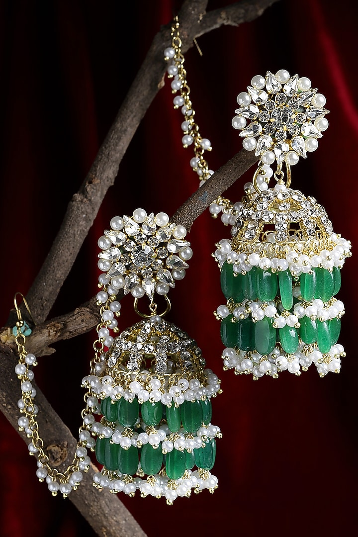Gold Finish Crystal & Semi-Precious Green Stone Jhumka Earrings by Bijoux By Priya Chandna at Pernia's Pop Up Shop