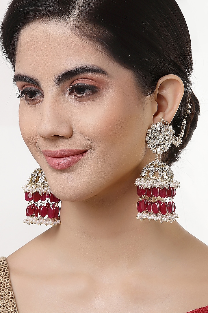Gold Finish Crystal & Semi-Precious Red Stone Jhumka Earrings by Bijoux By Priya Chandna