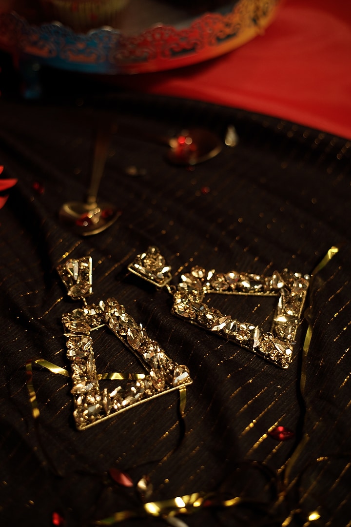 Gold Finish Crystal Dangler Earrings by Bijoux By Priya Chandna at Pernia's Pop Up Shop