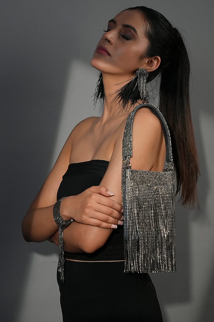 Black Faux Leather Crystal Embroidered Nano Fringe Bag by Bijoux By Priya Chandna at Pernia's Pop Up Shop
