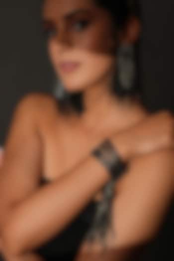 Gunmetal Finish Black Shimmering Crystal Dangling Bracelet by Bijoux By Priya Chandna at Pernia's Pop Up Shop