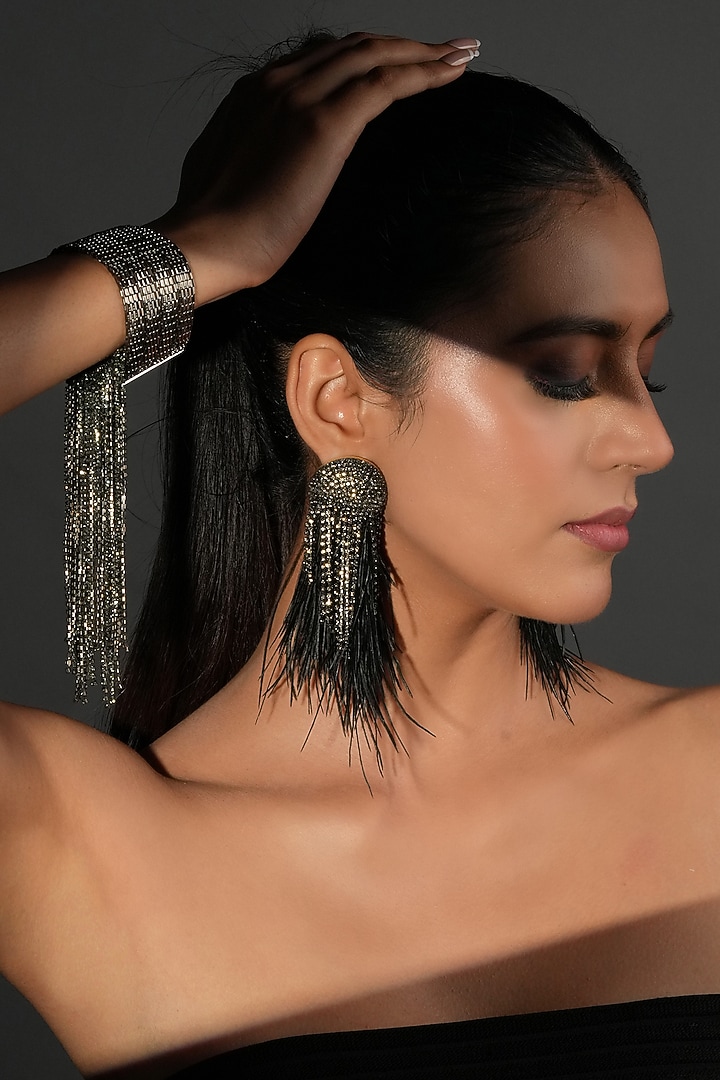 Gunmetal Finish Black Shimmering Crystal Dangling Bracelet by Bijoux By Priya Chandna at Pernia's Pop Up Shop