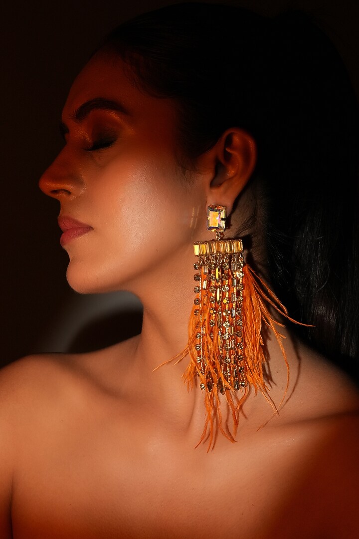 Gold Finish Fiery Orange Feather & Crystal Dangler Earrings by Bijoux By Priya Chandna at Pernia's Pop Up Shop