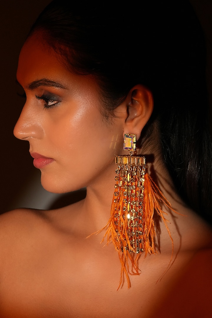 Gold Finish Fiery Orange Feather & Crystal Dangler Earrings by Bijoux By Priya Chandna at Pernia's Pop Up Shop