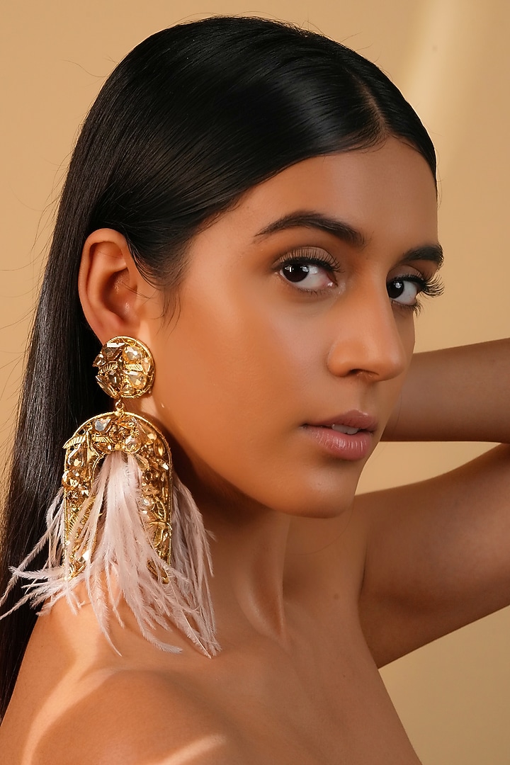 Gold Finish Ivory Feather & Crystal Dangler Earrings by Bijoux By Priya Chandna at Pernia's Pop Up Shop