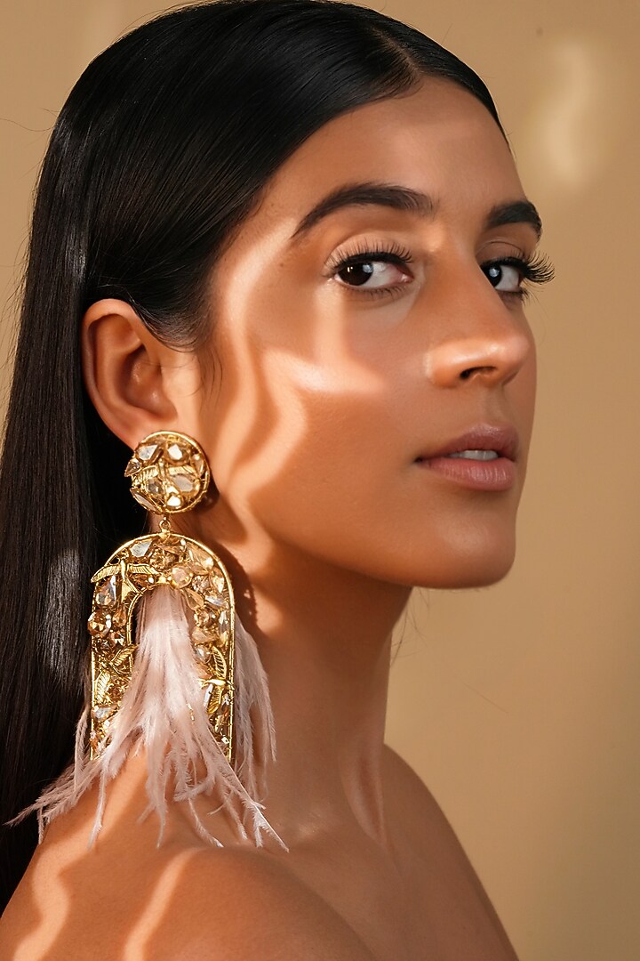 Gold Finish Ivory Feather & Crystal Dangler Earrings by Bijoux By Priya Chandna at Pernia's Pop Up Shop
