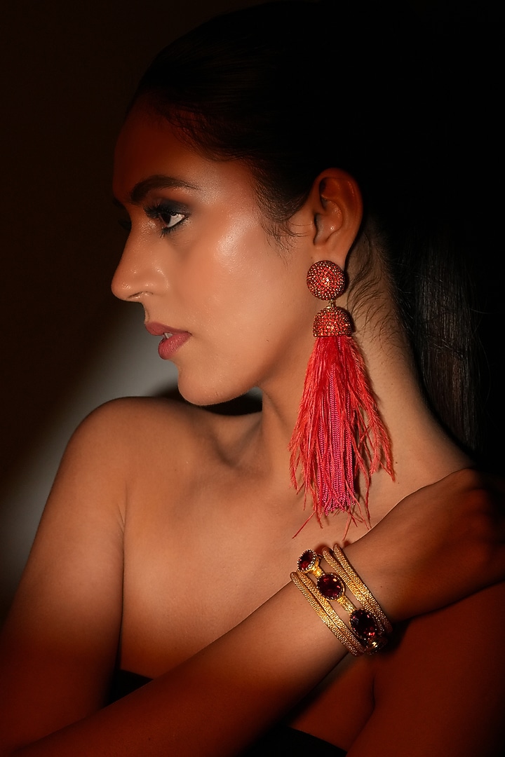 Gold Finish Red Feather & Crystal Dangler Earrings by Bijoux By Priya Chandna at Pernia's Pop Up Shop