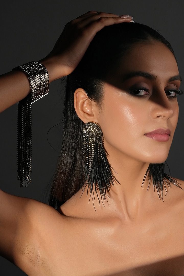 Gunmetal Finish Black Feather & Crystal Dangler Earrings by Bijoux By Priya Chandna at Pernia's Pop Up Shop