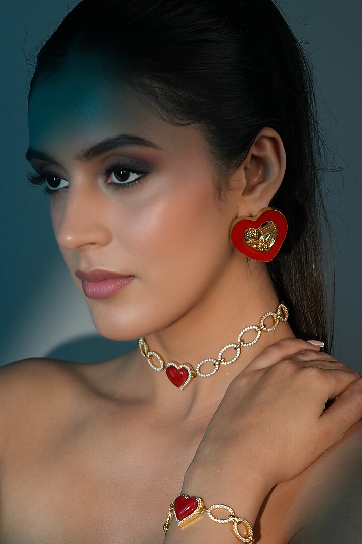 Gold Finish Crystal Red Enameled Heart Stud Earrings by Bijoux By Priya Chandna at Pernia's Pop Up Shop