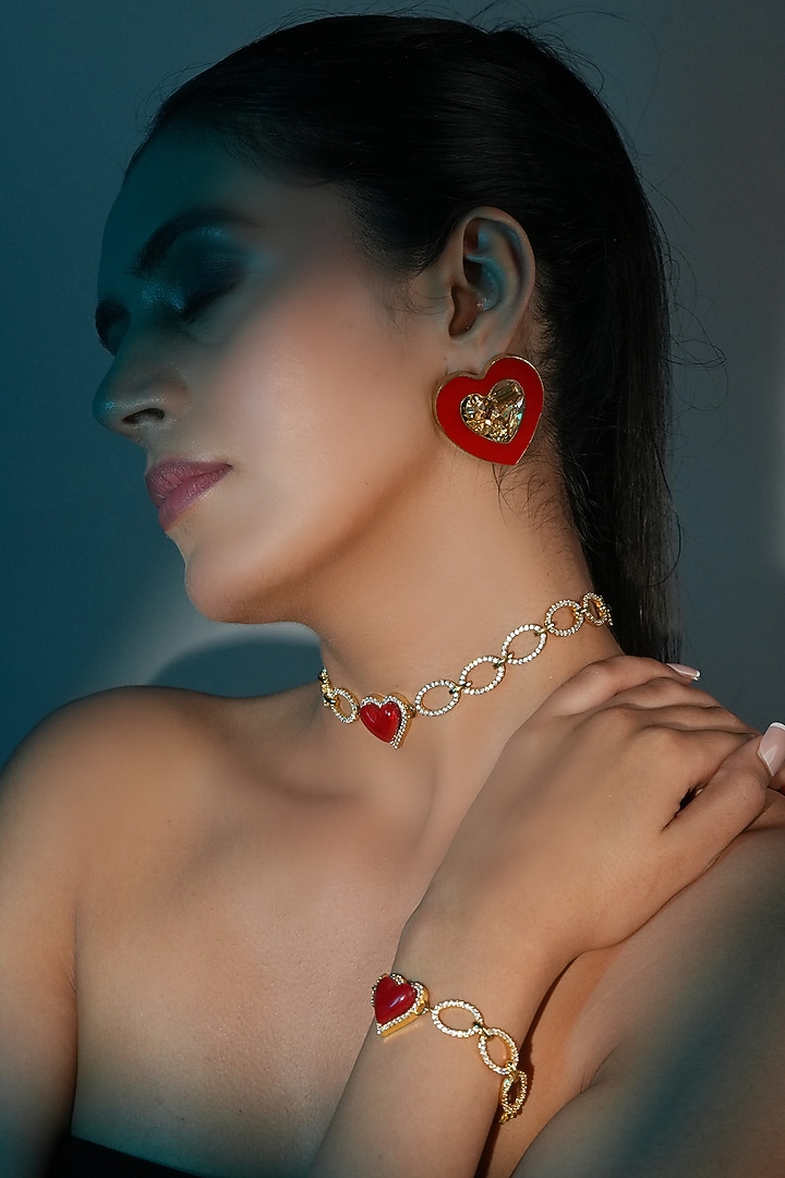 Gold Finish Crystal Red Enameled Heart Stud Earrings by Bijoux By Priya Chandna at Pernia's Pop Up Shop