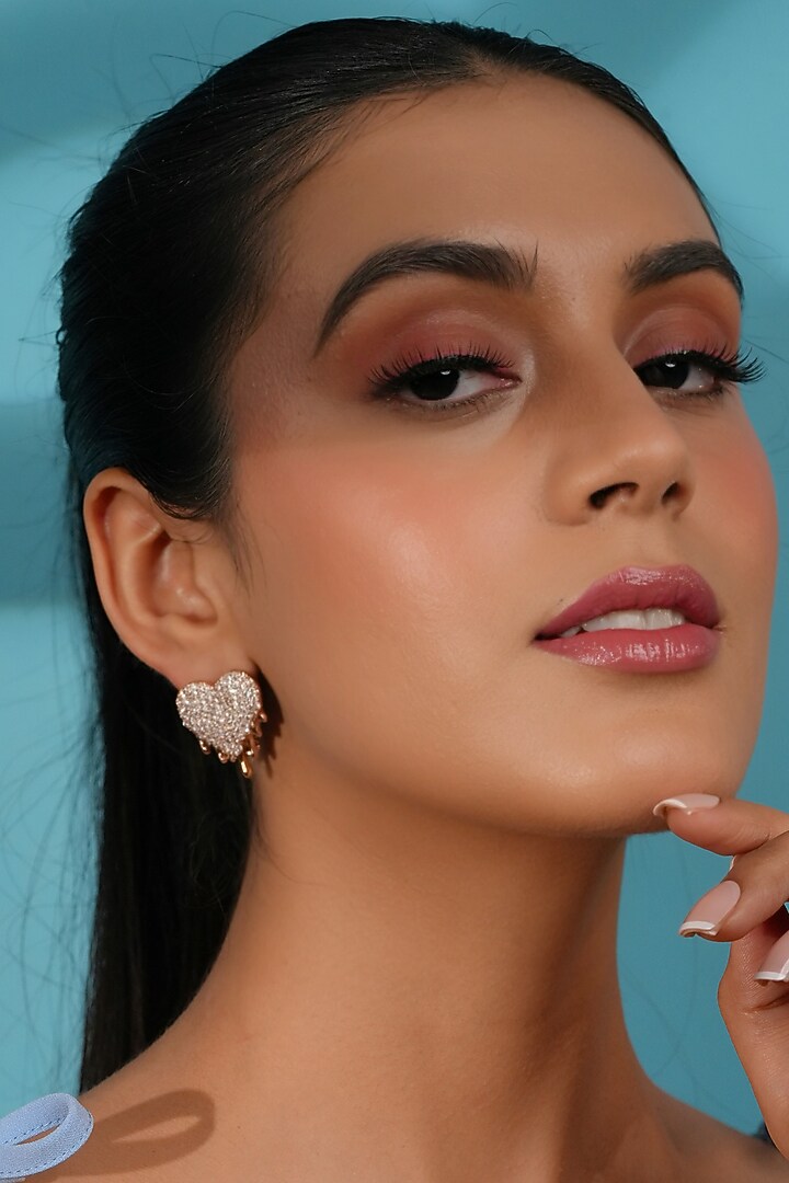 Rose Gold Finish Crystal Heart Stud Earrings by Bijoux By Priya Chandna at Pernia's Pop Up Shop