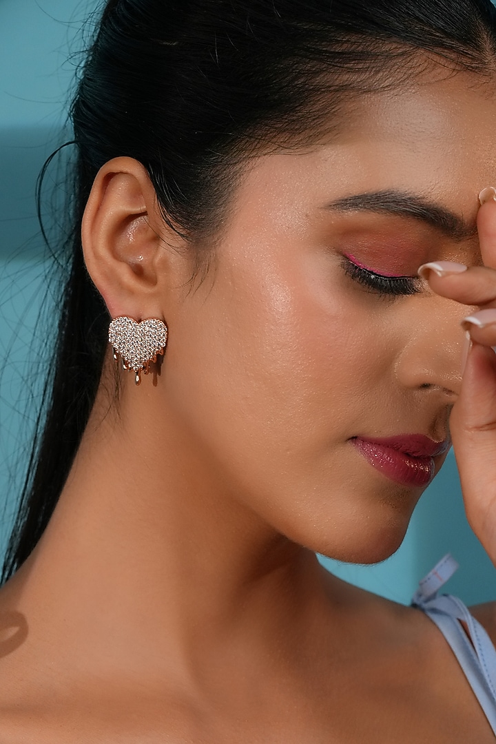 Rose Gold Finish Crystal Heart Stud Earrings by Bijoux By Priya Chandna at Pernia's Pop Up Shop