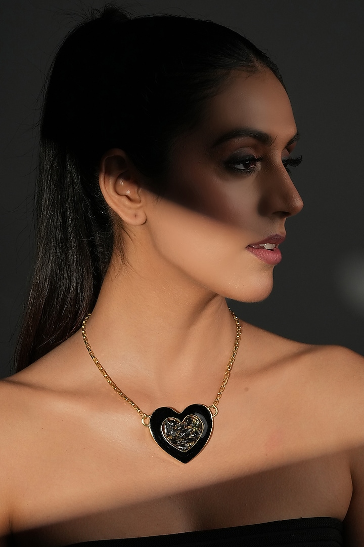 Gold Finish Crystal & Black Enameled Heart Pendant Necklace by Bijoux By Priya Chandna at Pernia's Pop Up Shop