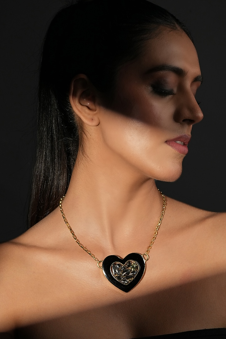Gold Finish Crystal & Black Enameled Heart Pendant Necklace by Bijoux By Priya Chandna at Pernia's Pop Up Shop