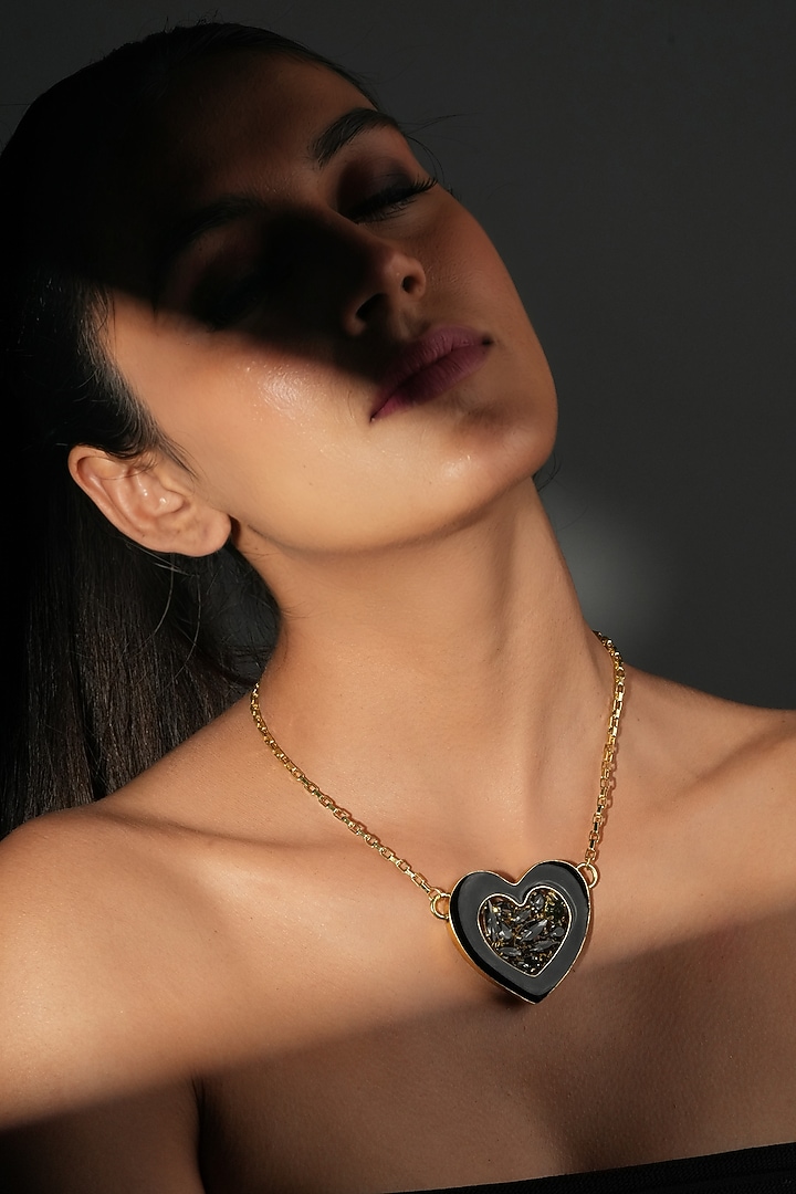 Gold Finish Crystal & Black Enameled Heart Pendant Necklace by Bijoux By Priya Chandna at Pernia's Pop Up Shop