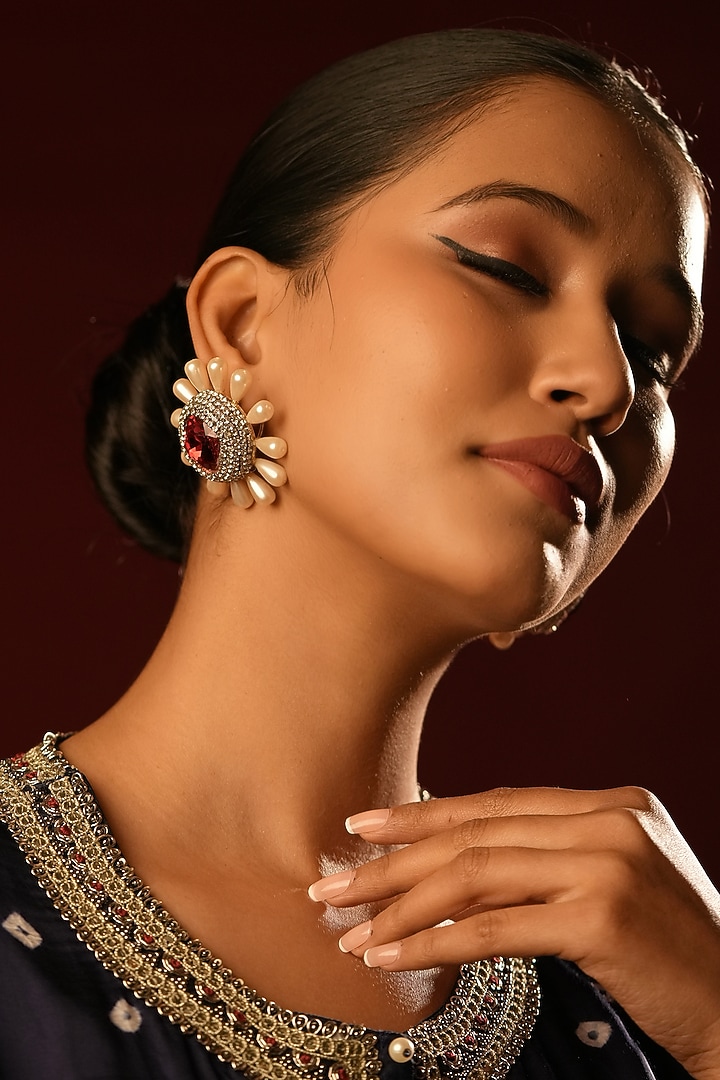 Gold Finish Ruby Crystal & Pearl Floral Stud Earrings by Bijoux By Priya Chandna at Pernia's Pop Up Shop