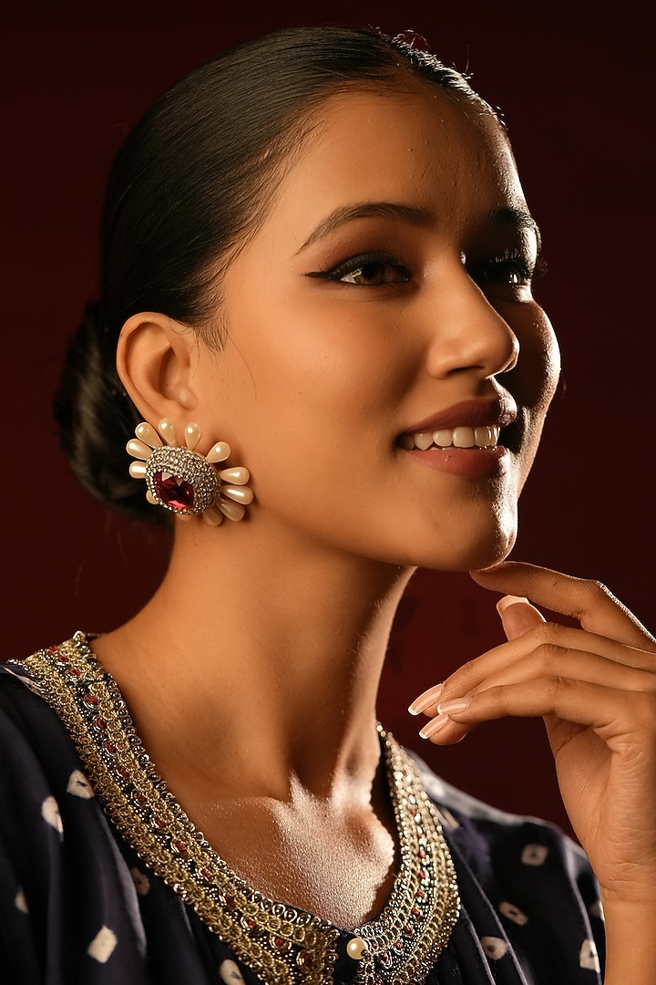 Gold Finish Ruby Crystal & Pearl Floral Stud Earrings by Bijoux By Priya Chandna at Pernia's Pop Up Shop